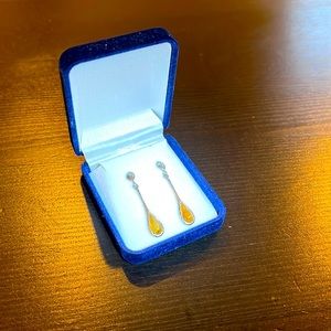 Antique silver drop earrings with a yellow stone inlay